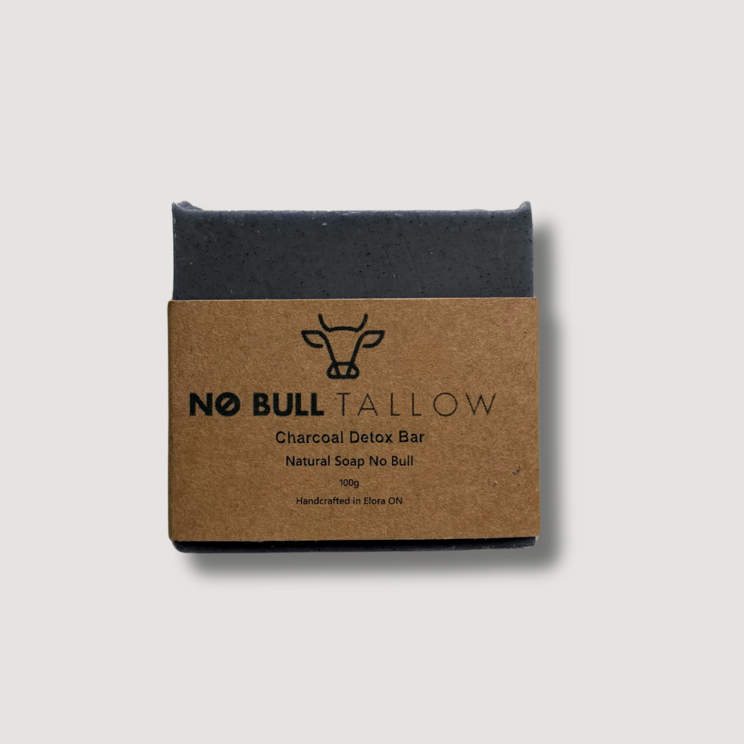 Charcoal Detox tallow soap bar on beige background - Deep cleansing natural soap with activated charcoal