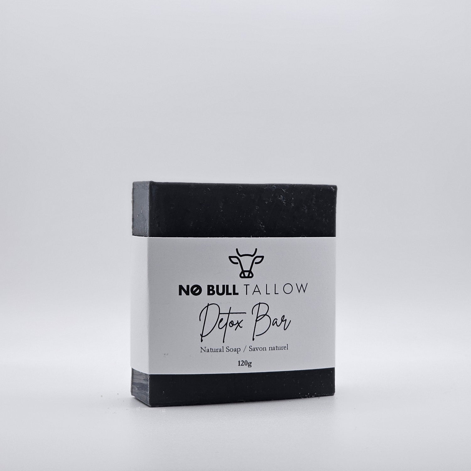 Charcoal Detox tallow soap bar on beige background - Deep cleansing natural soap with activated charcoal