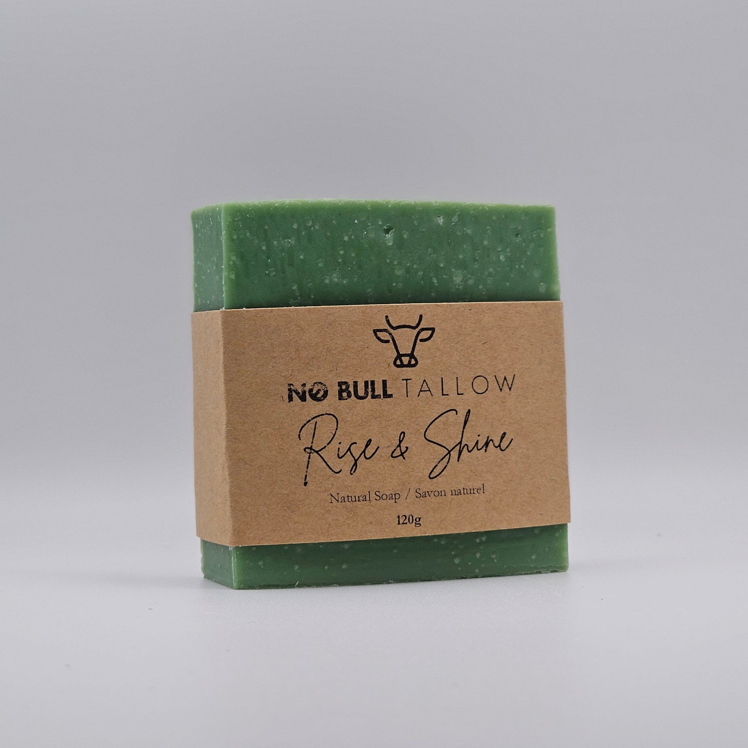 Rise and shine tallow soap bar on beige background - bright and fresh natural soap with pine cedarwood and spearmint