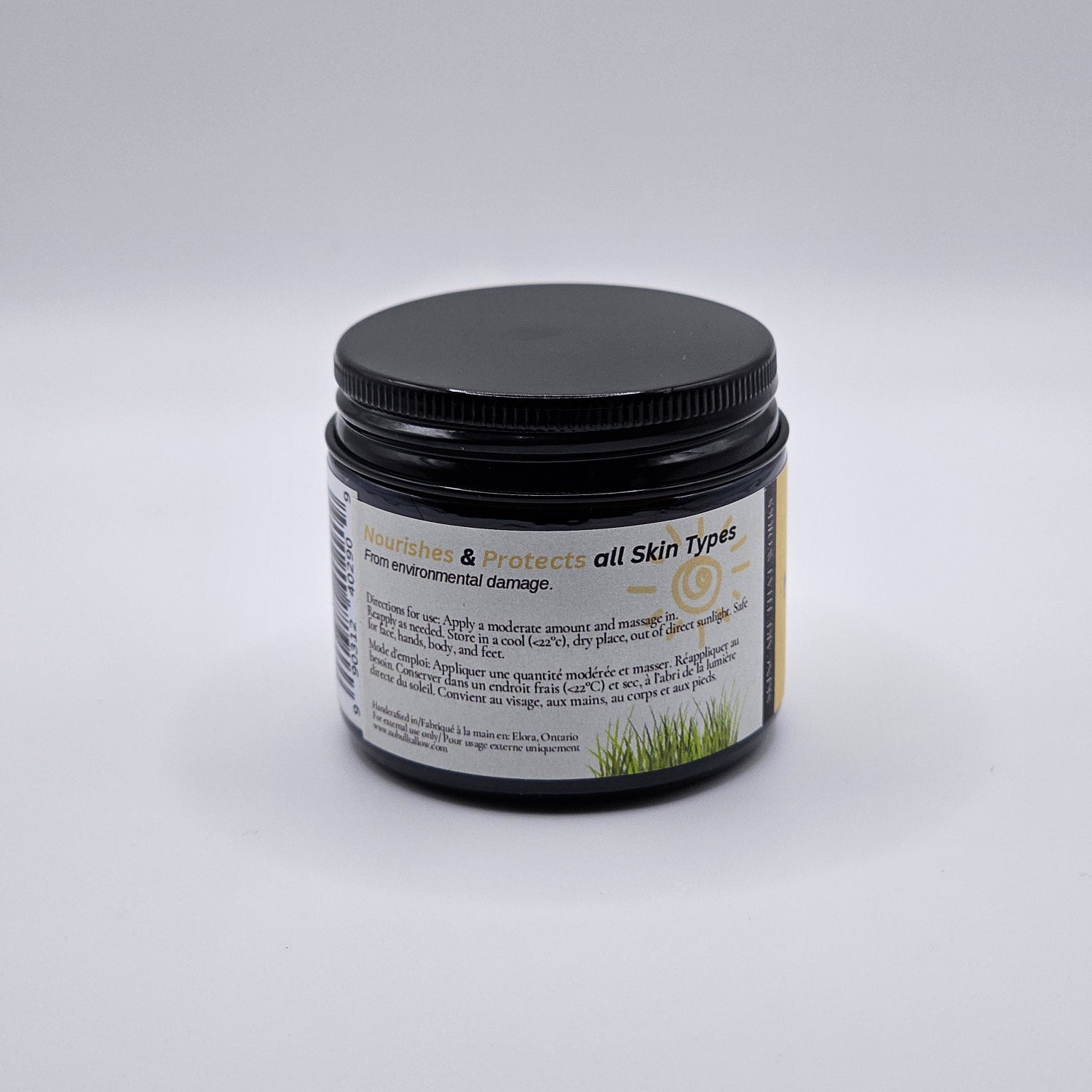 a side facing jar of no bull tallow natural sun balm showing its description