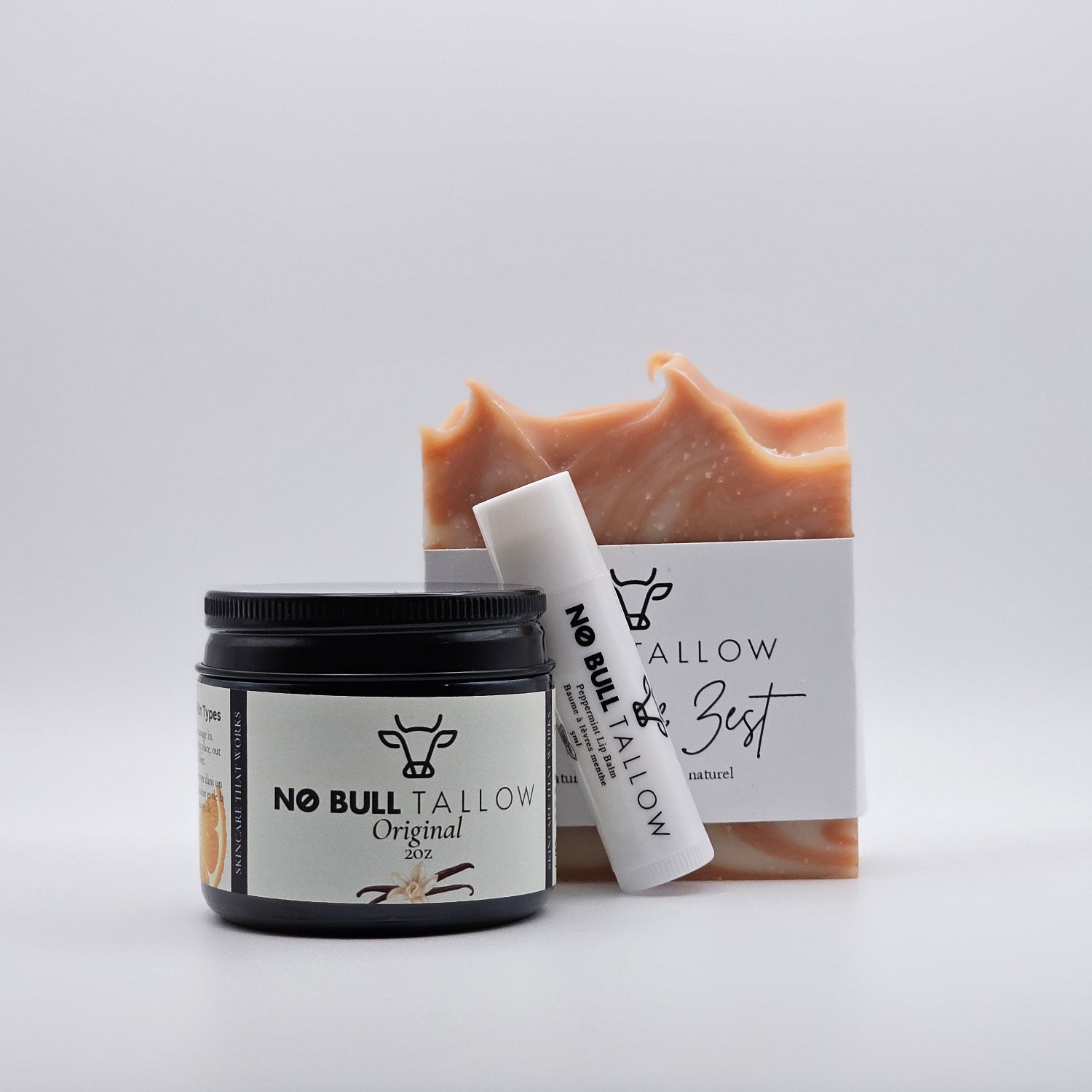 No Bull Tallow products including a body butter, lip balm, and natural soap on a white background