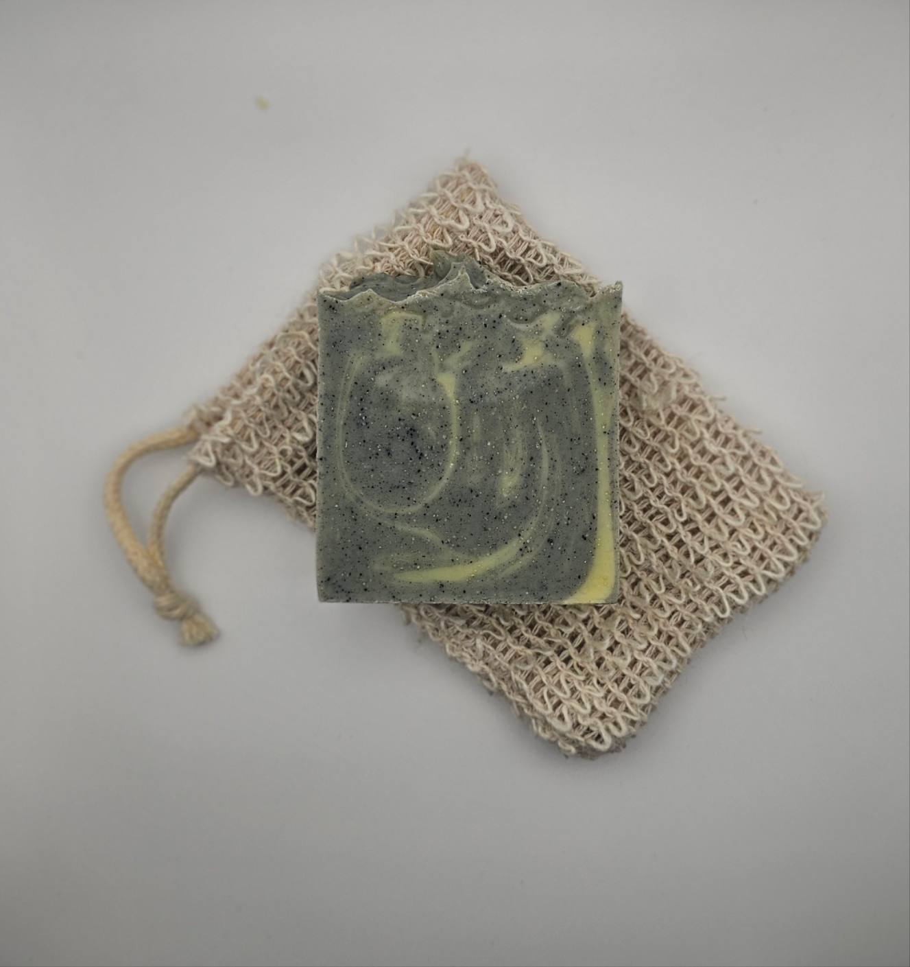 Natural hemp soap bag with tallow soap on top