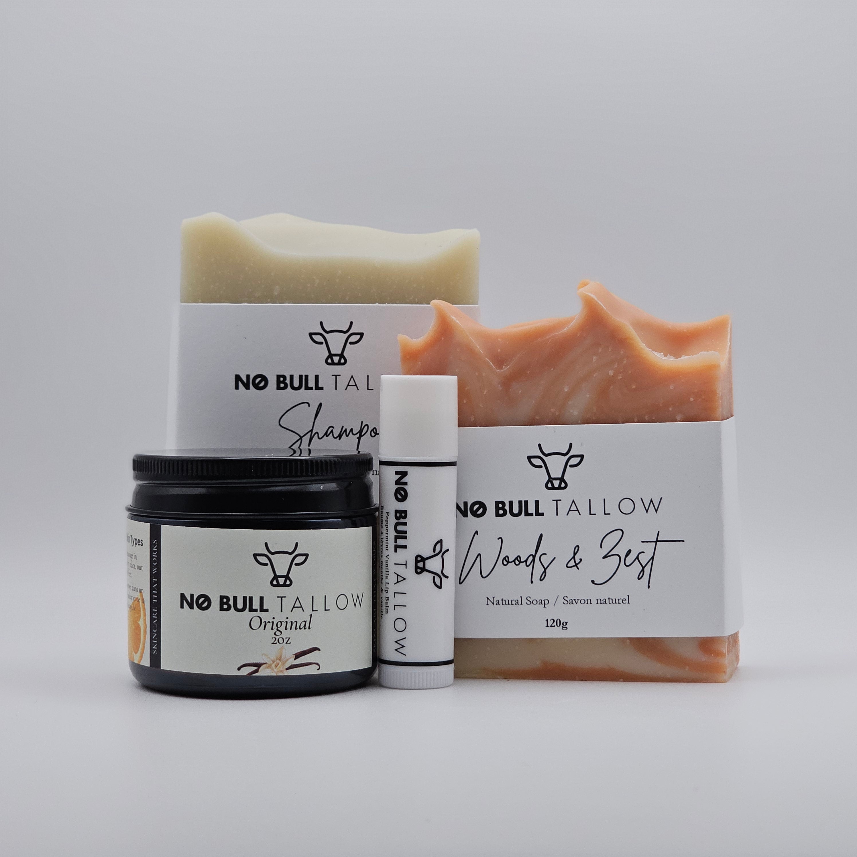 Collection of 'No Bull Tallow' products including soap, shampoo, and body butter on a white background.