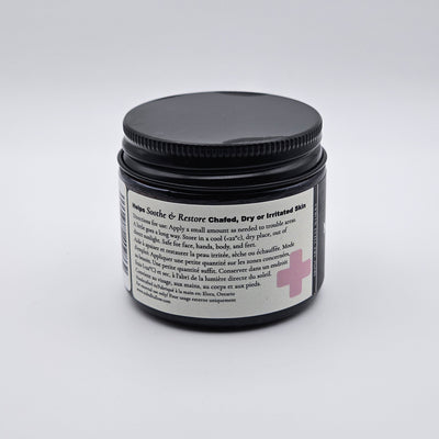 Jar of Raw Hide Relief tallow skin repair cream on a white background