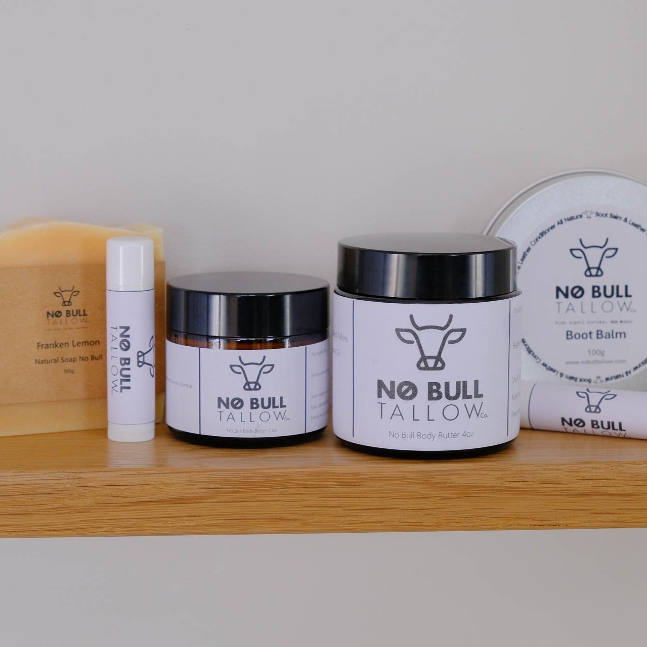 no bull tallow product assortment on wood shelf