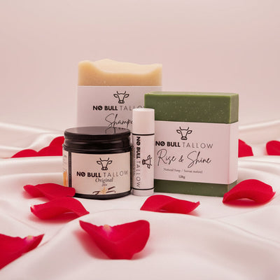 Valentine's complete tallow set. soap, shampoo, lip balm, and body butter on silk cloth with roses