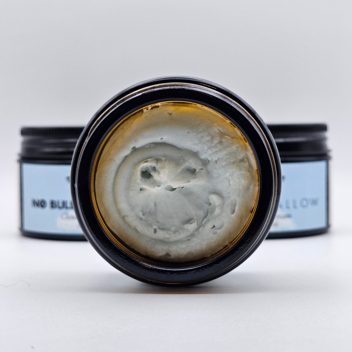 close-up of tallow cloud cream showing its soft texture