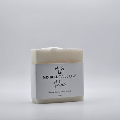 Pure Unscented tallow soap bar on beige background – fragrance-free natural soap for sensitive skin