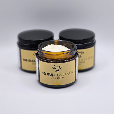 3 jars of natural beef tallow sun balm on white backrop